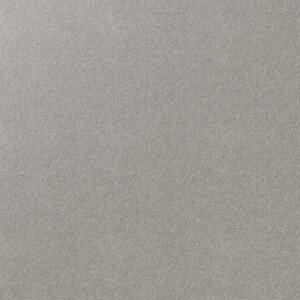 Elegant light grey carpet with a smooth stipple texture. Close-up of light grey carpet texture for modern flooring design.