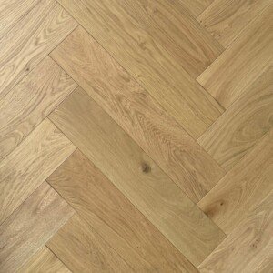 Paris Herringbone hybrid flooring with warm oak tones installed in a modern interior.